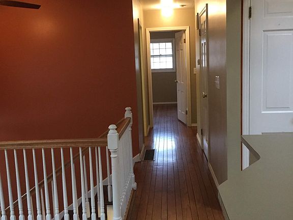 Hall way to upstairs three bedrooms