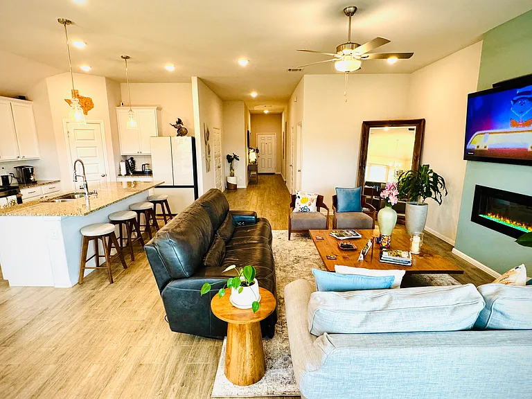 Welcome to this stunning and spacious open-concept home designed for comfort, style, and modern living. The main living area features a bright and airy layout that seamlessly connects the living room, dining area, and kitchen, creating the perfect space.