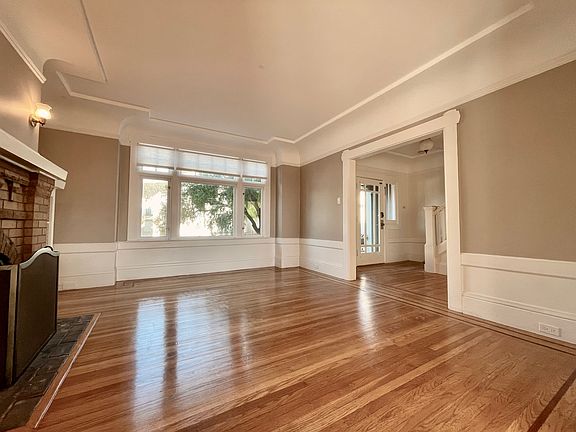 View from the living room towards the entrance and hallway
