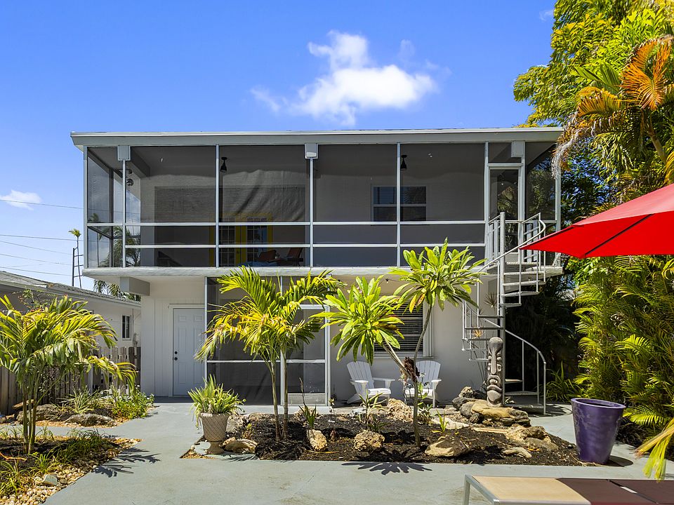 View from backyard - Unit is on the first floor to the right.