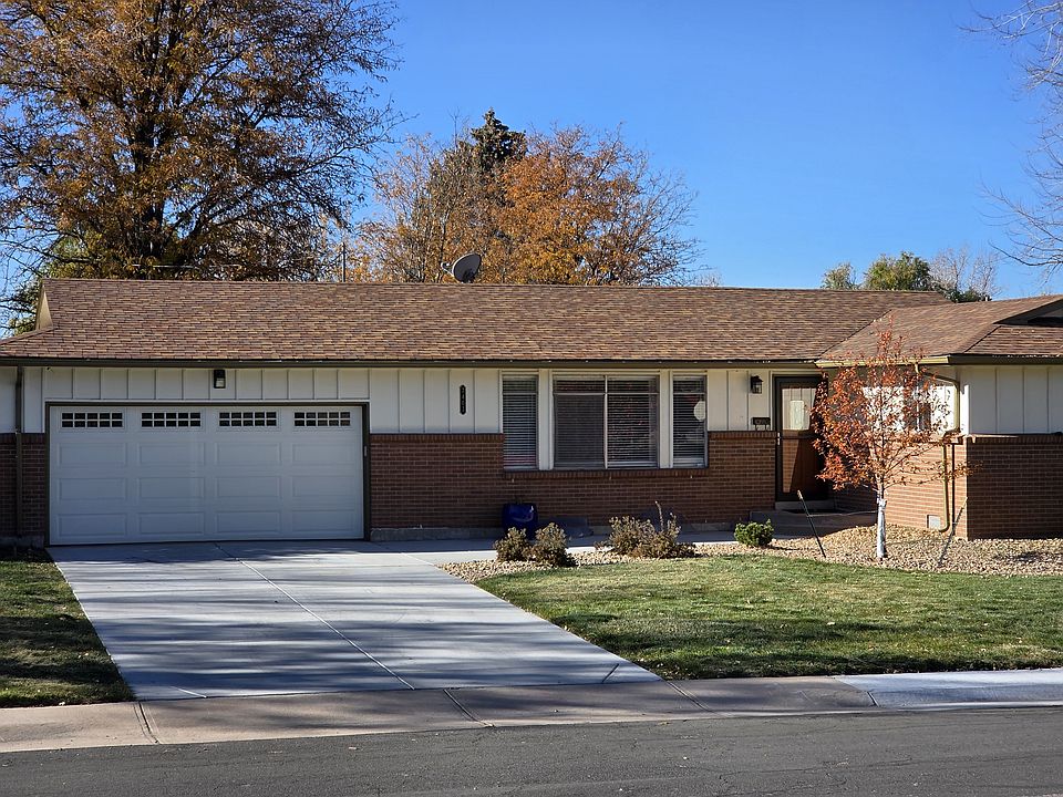 Front of House with new driveway and landscaping