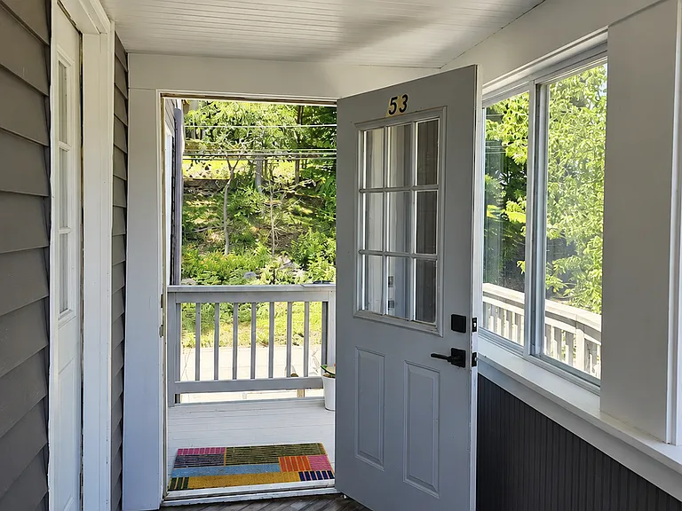 The first door to your unit opens up into an all season mud room. Big sliding glass windows open for cool breezes in spring and fall.