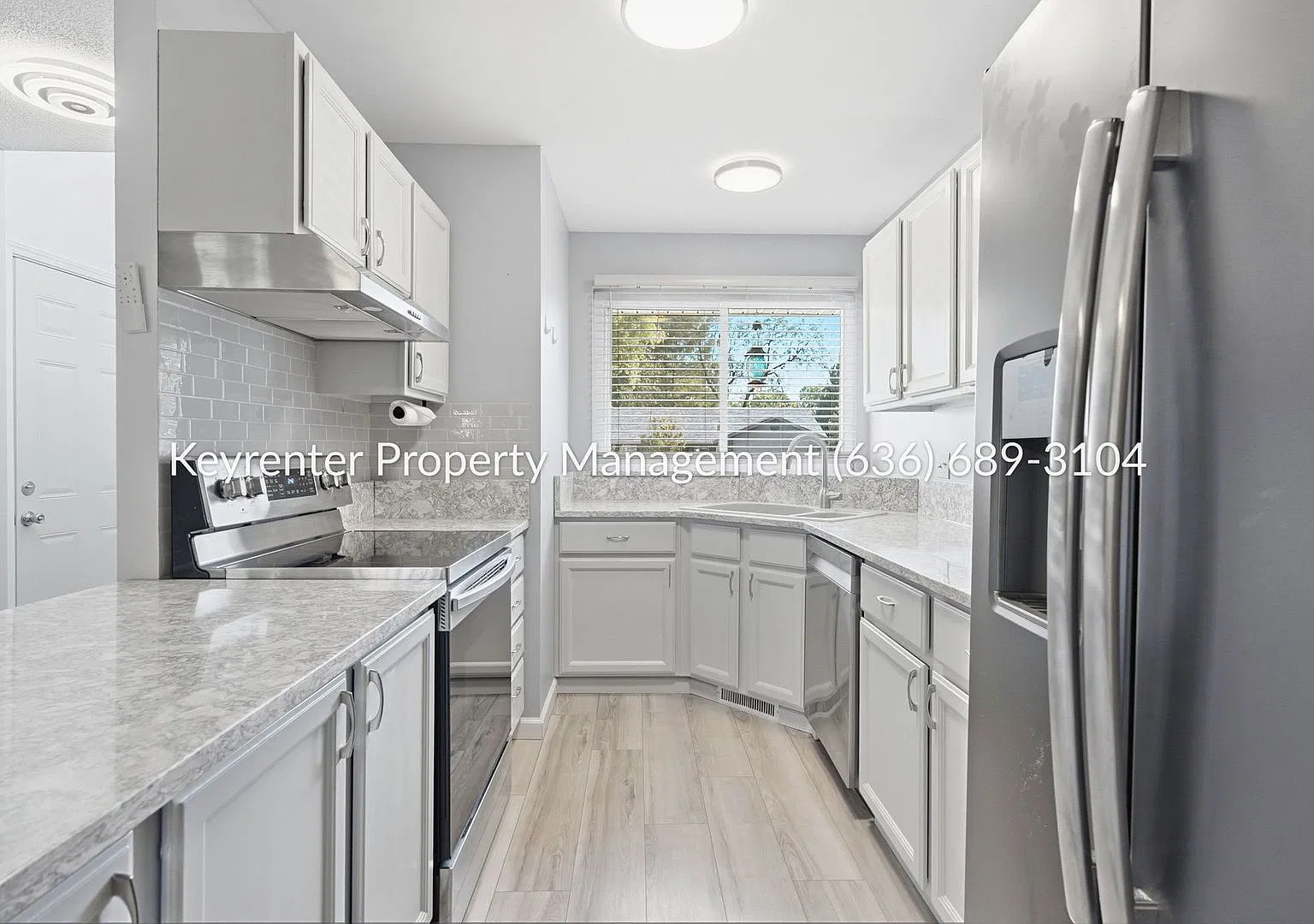 Spacious & Stylish 2-Bedroom Duplex with Attached Garage! — Photo 2