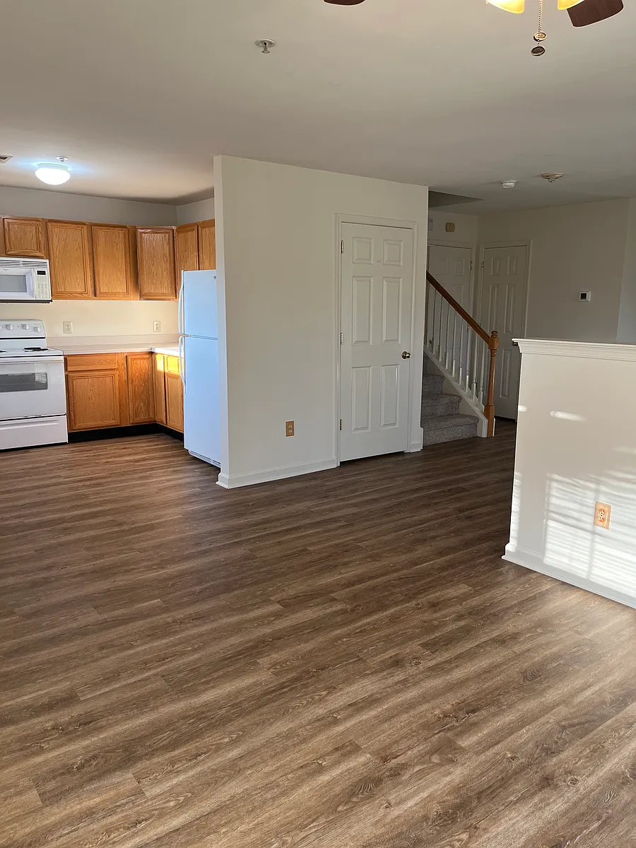 Entire townhome has brand new flooring - 211 Prairie Ct