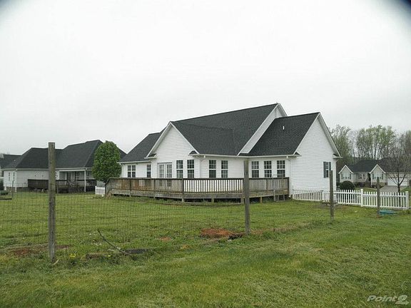 Rear View of Home with Deck