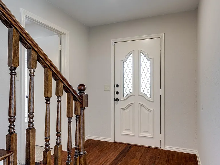 Hardwood floors at entry.