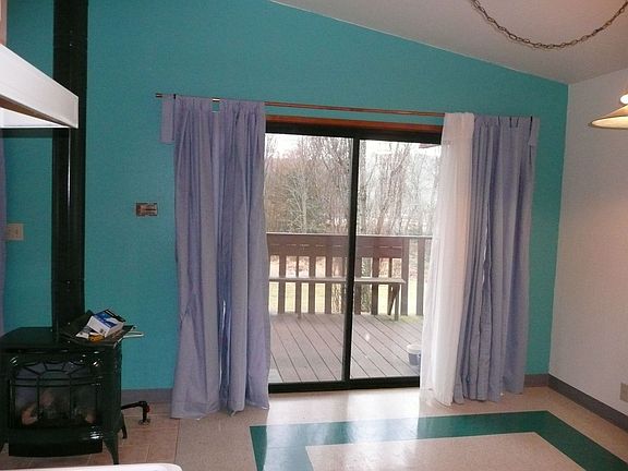 looking out sliding door to the Olympic Mtns.