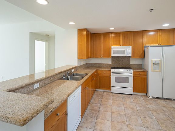 Open Kitchen to the Living Room and Dining area.