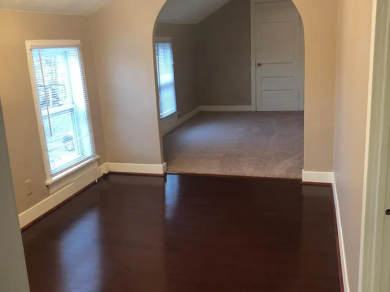 Nice sized dining room with hard wood floors.