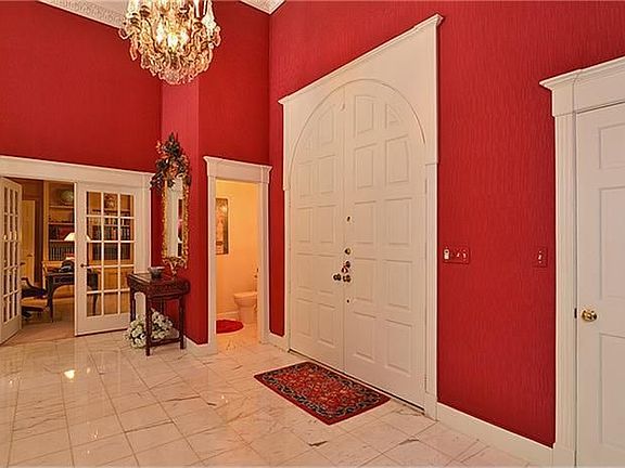 Elegance greets your guests as they enter through the front door into the lovely open foyer.