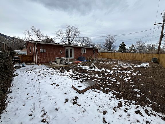 Large backyard with privacy fence