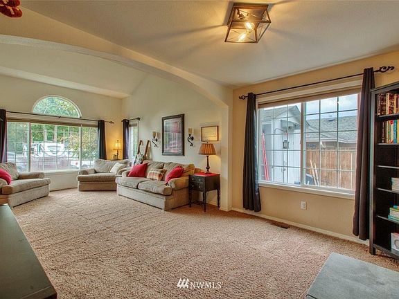 Open concept, light and bright!  Great shed on side of house too!