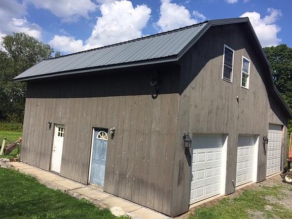 White door on the left, is the entrance to second floor studio the apartment.