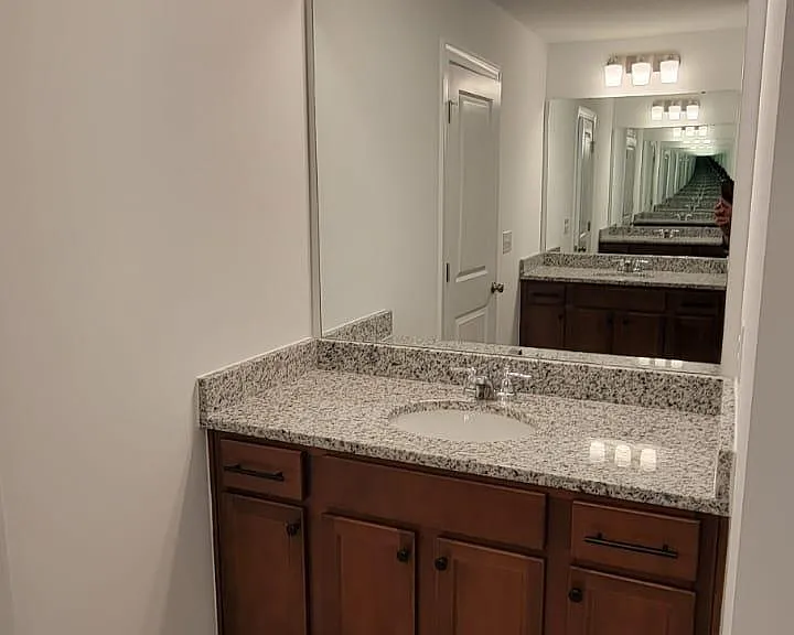 Two opposing sinks at the master bedroom