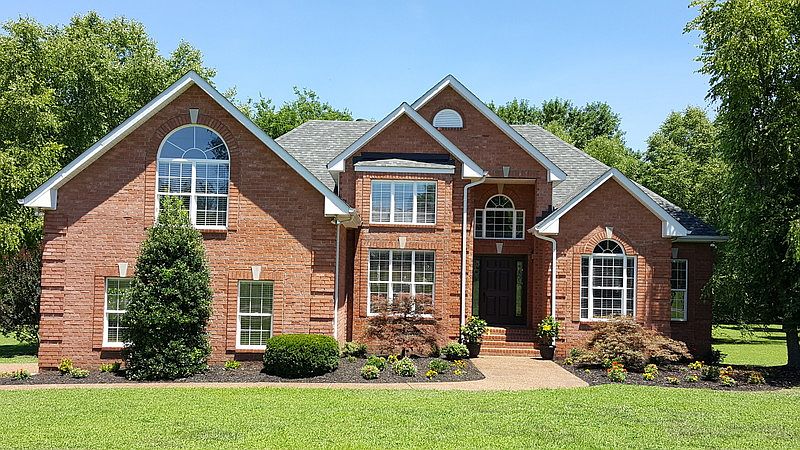 Beautiful curb appeal!
						:
						Mature Japanese Maples and color flowers!!!
