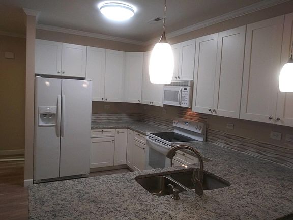 Kitchen with granite countertops and all appliances
