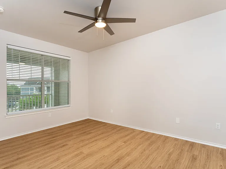 Bedroom with hard surface flooring