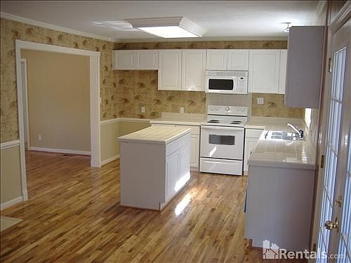 KITCHEN VIEWED FROM DEN