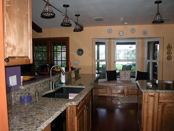 Granite Countertops, Hardwood Floors, Window Seat all overlooking the Lake