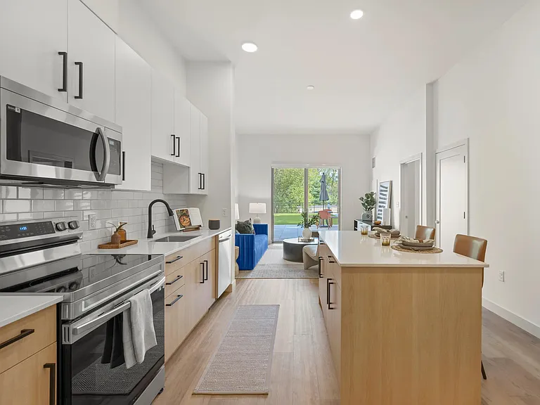 Each apartment home is equipped with Samsung_ stainless steel appliance packages.
