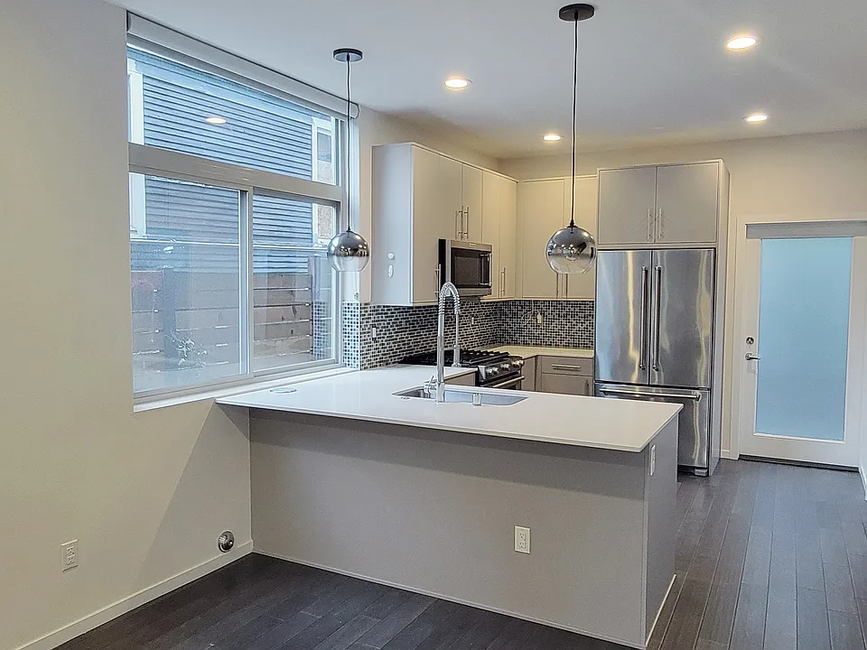 Kitchen with gas stove and modern appliances