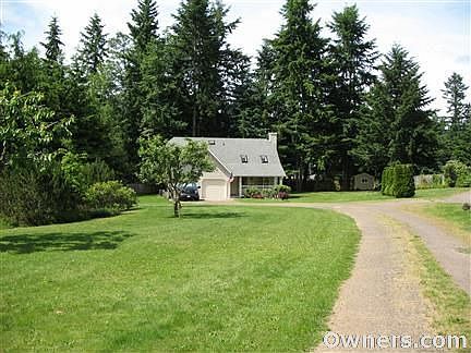 Large yard with fruit trees