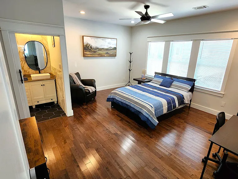 A comfortable, high-end room designed for a peaceful stay, with generous space and a spacious bathroom