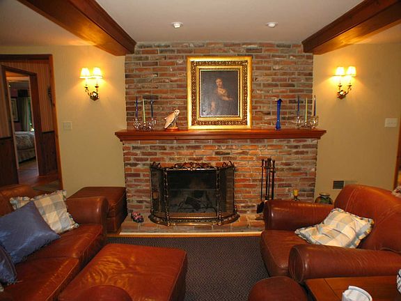 Step-down living room with fireplace