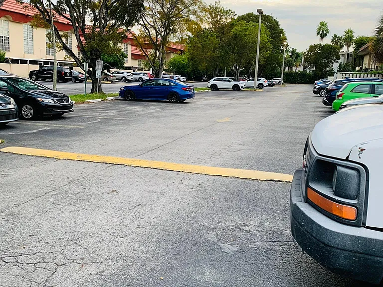 Condominium, Gated Parking Lot.