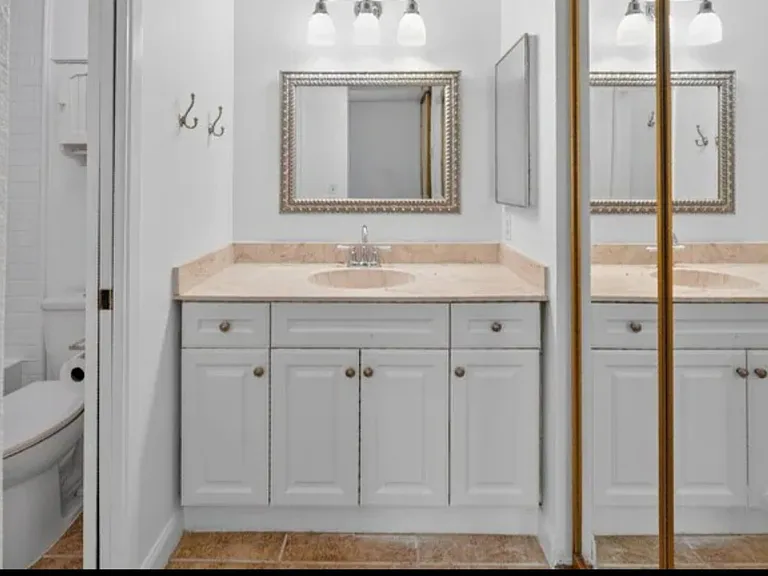 Separate vanity and closet off bathroom