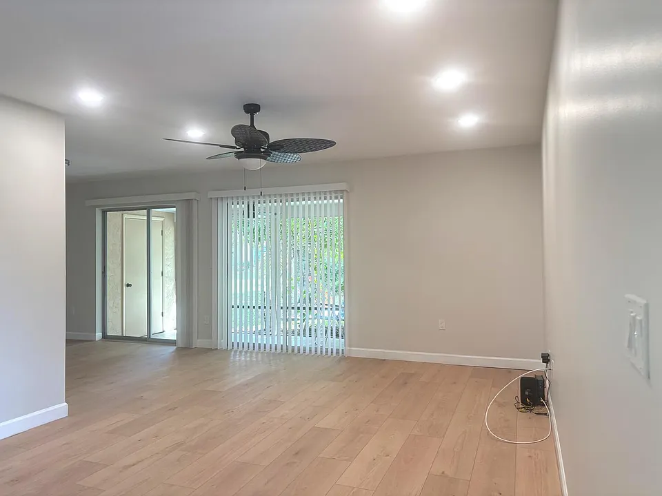 Bright, open living area with brand-new finishes throughout _ completely renovated from walls to ceiling.