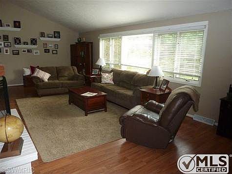 Spacious living room with vaulted ceilings.