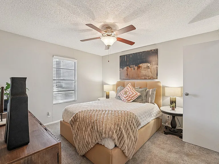 Inviting Bedroom with Plush Comforts in Waco Apartments