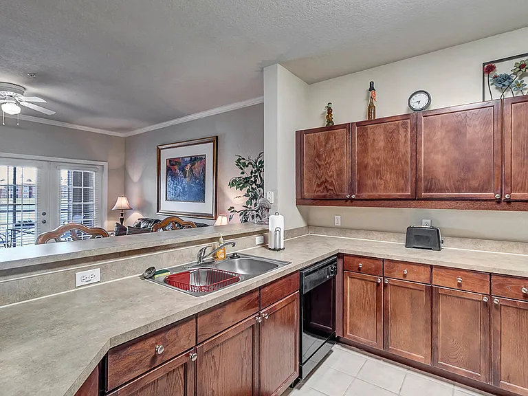 Kitchen with Black Appliances & Ample Cabinetry
