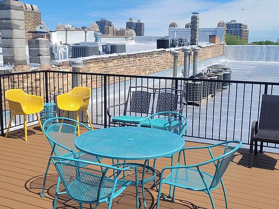 Roof-top deck with breathtaking Skyline view.