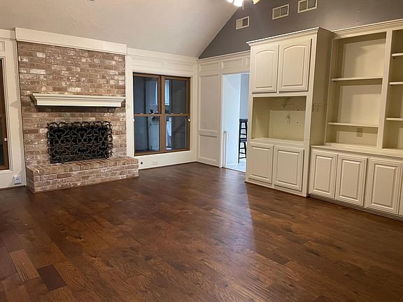 Living room looking into breakfast/kitchen