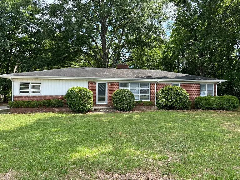 1901 S New Hope Rd — Photo 1