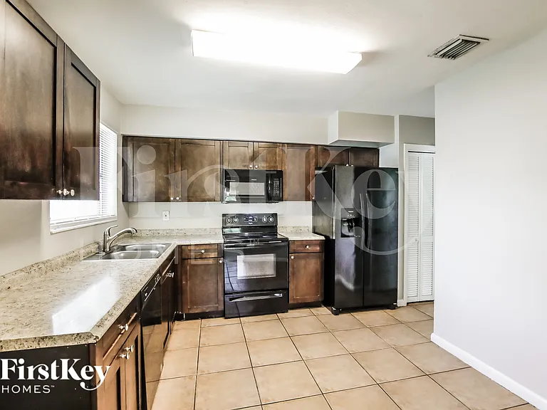 4896 NW 6th Ct — Photo 8