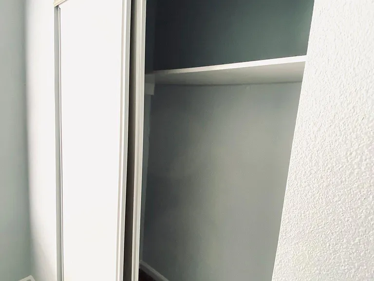 Upstairs front-facing bedroom closet