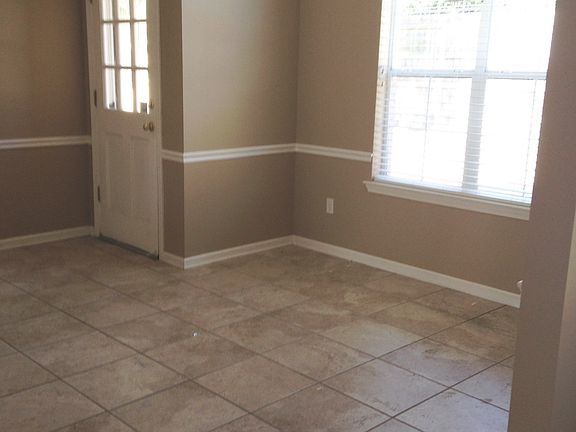 Eat-in kitchen overlooking pool