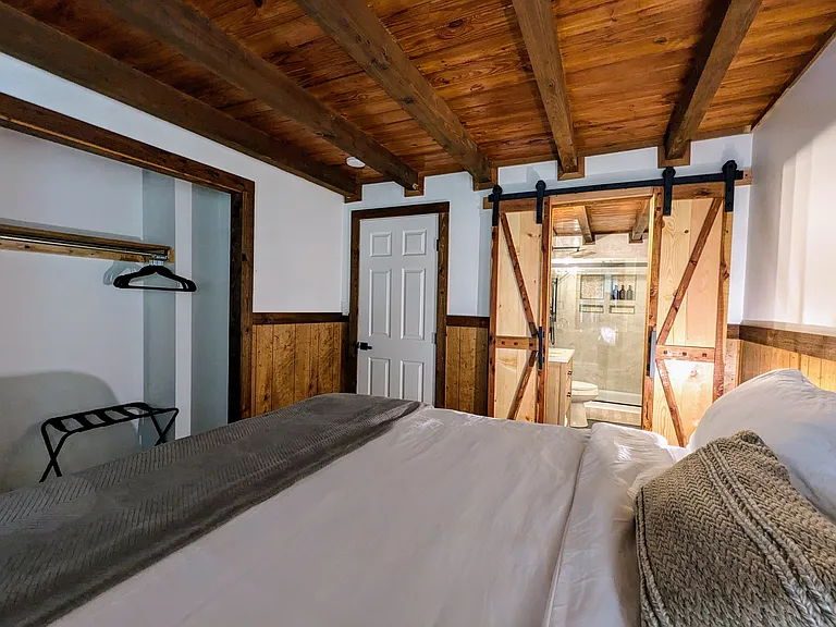 MAIN LEVEL MASTER BEDROOM (sleeps 2): King Bed with Attached Master Bathroom