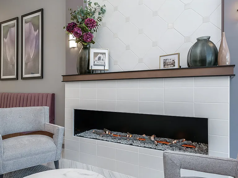 Hotel Style lobby with complimentary coffee bar, fireplace, seating and computer/printer