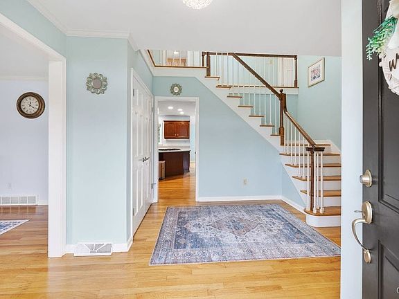 An inviting entry-way welcomes you into the home.