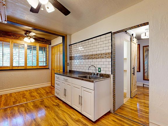 STAINLESS STEAL SINK AND KITCHEN CABINETRY