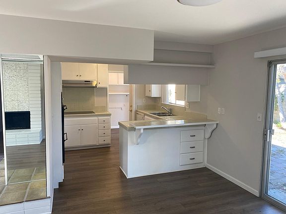 Clean Kitchen with Direct Access to Dinning Room and ENCLOSED Laundry room