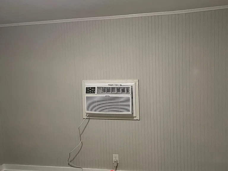 Third bedroom with new window air conditioner