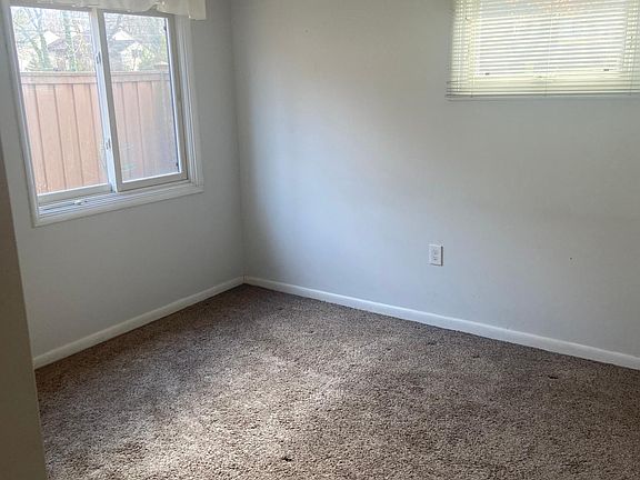 Bedroom with lighted ceiling fan
