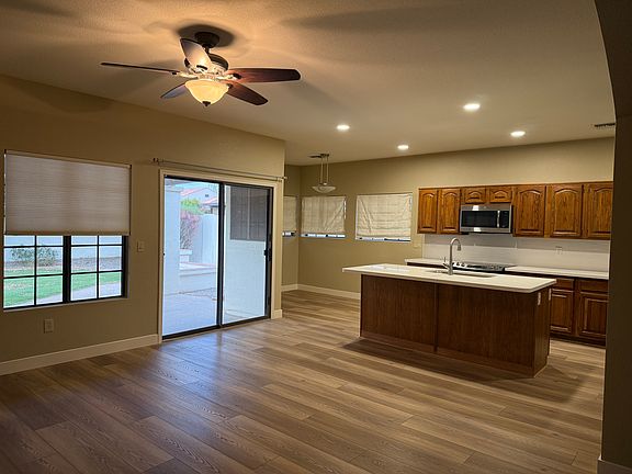 Large Family room opening into Kitchen, sliding door to backyard