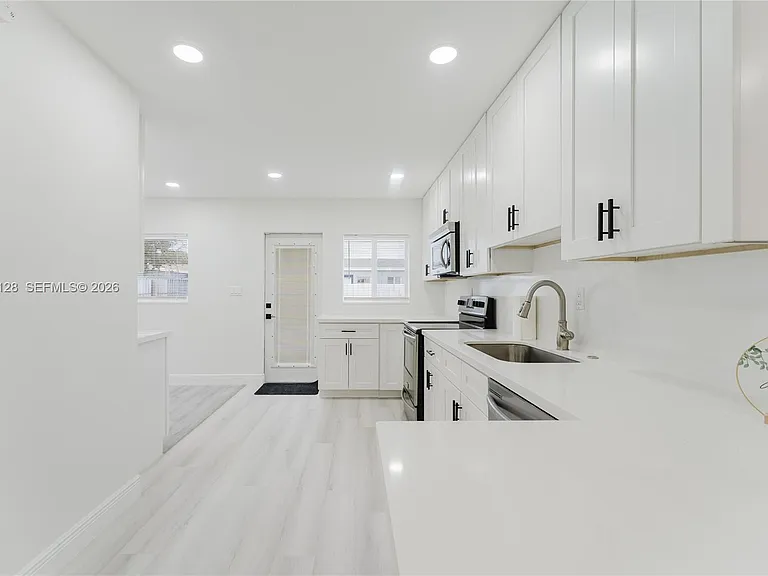 481 NE 51st St — Photo 17