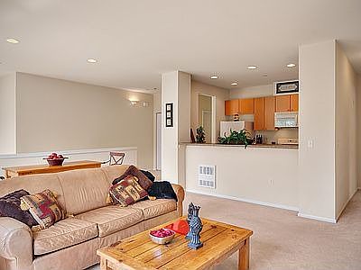 Spacious & open floor plan. Kitchen with eating bar opens to living room.